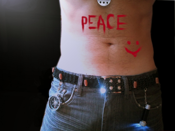 Hand-knit-to-measure deerskin steampunk utility belt featuring a compass and Promier Products LED Flashlight.