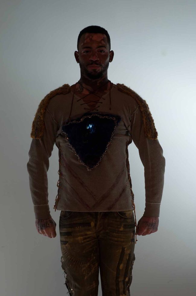 The LED NFC Tech Grunge Henley with rocker jeans.