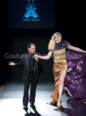 Here is the designer Andres..with a royal gold and purple cape model...isn't he so cute?