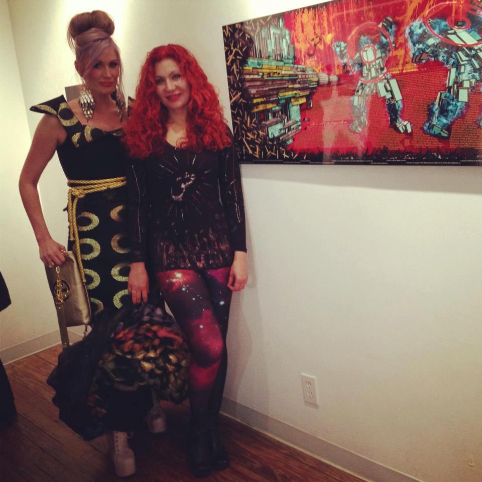 Marjan Moghaddam at her art show was out done by her fellow artist and friend Cristy's j-na couture gown.