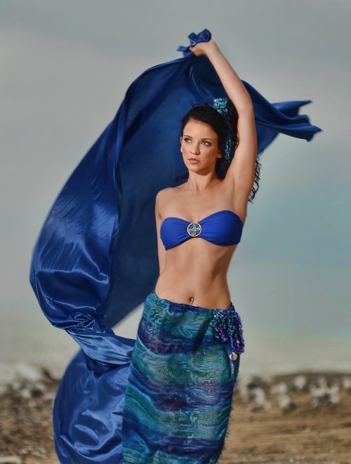 j-na beach sarong with shell adornment.