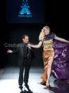 Here is the designer Andres..with a royal gold and purple cape model...isn't he so cute?